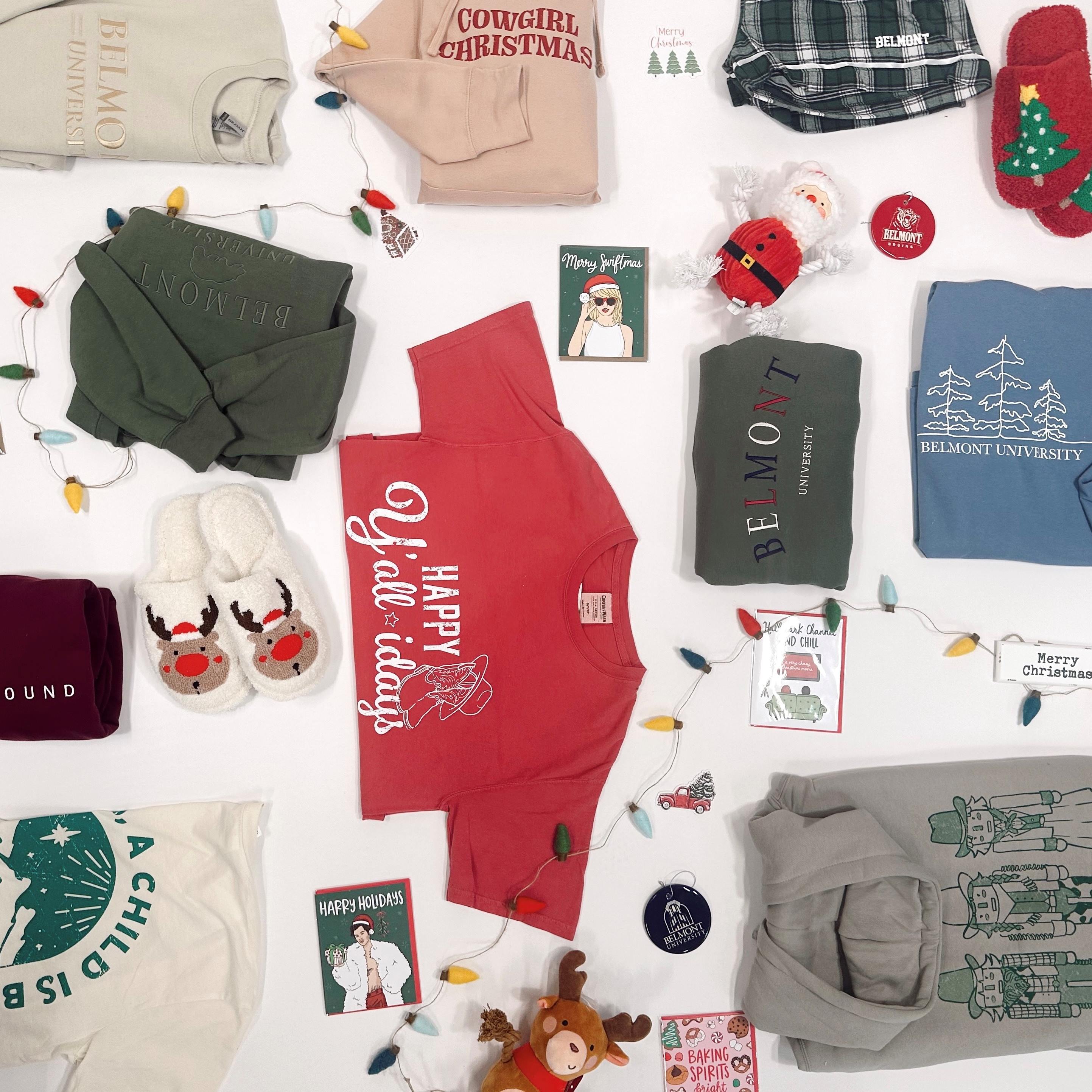 Flat lay of various Belmont branded Christmas merchandise. Click here to view on Instagram. 