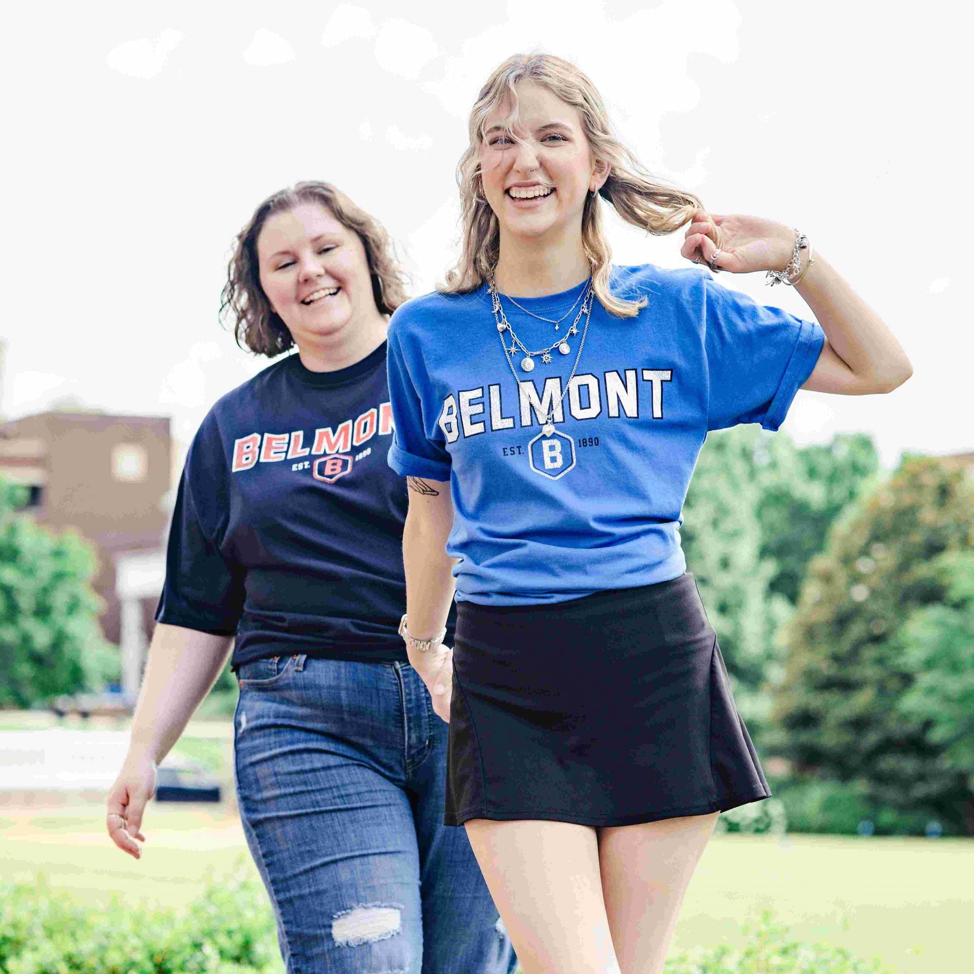 2 Belmont students wearing Belmont 'established 1890' tee shirts and smiling together. Click to view Instagram post