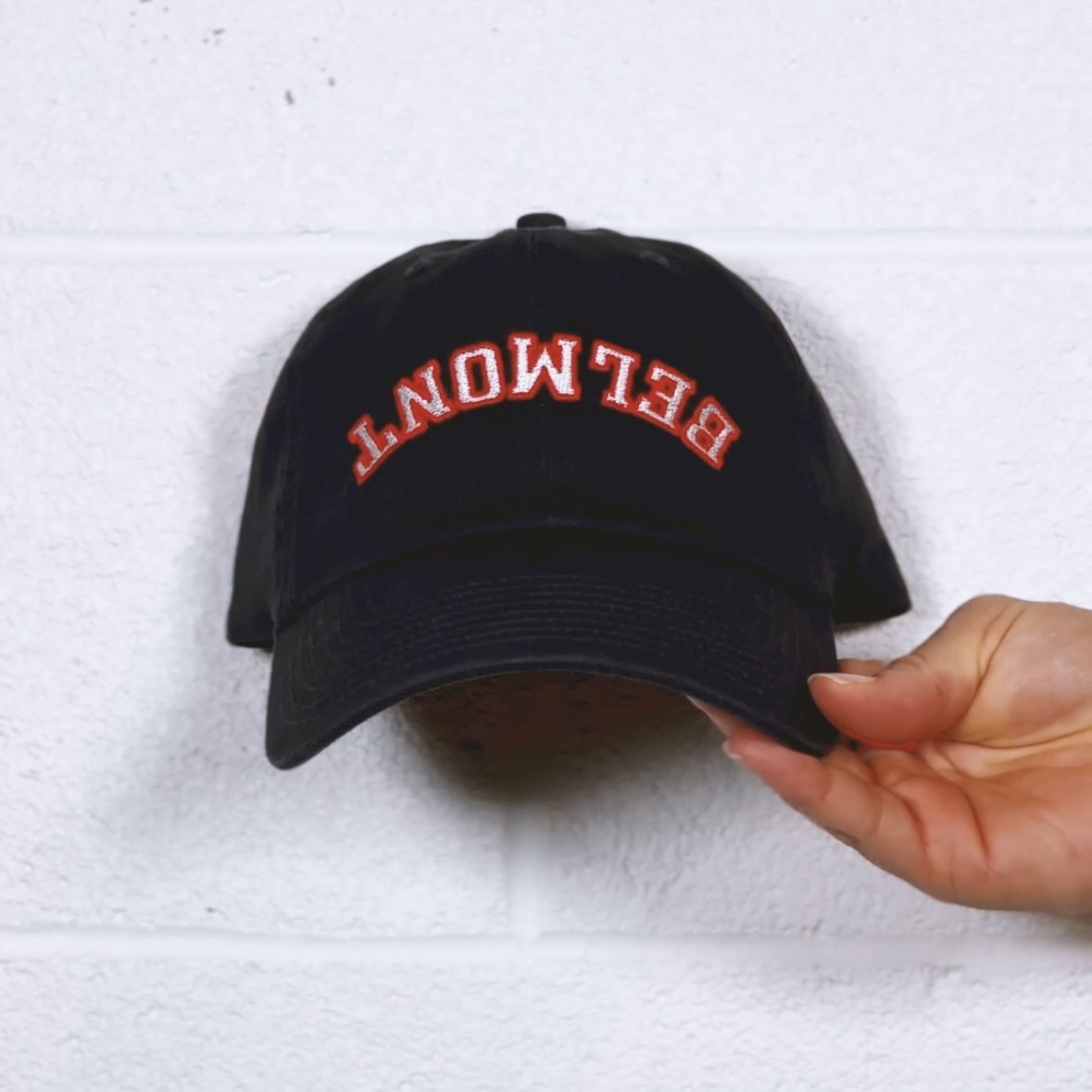 Closeup of the reversed logo Belmont twill cap. Click to view Instagram post